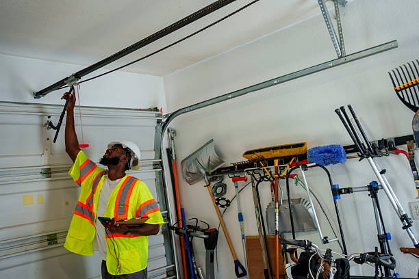 Professional Garage Door Panel Replacement technician working in Athena, OR